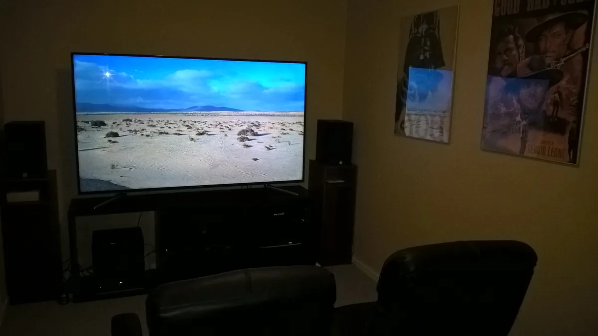 Home theater setup with a television and seating