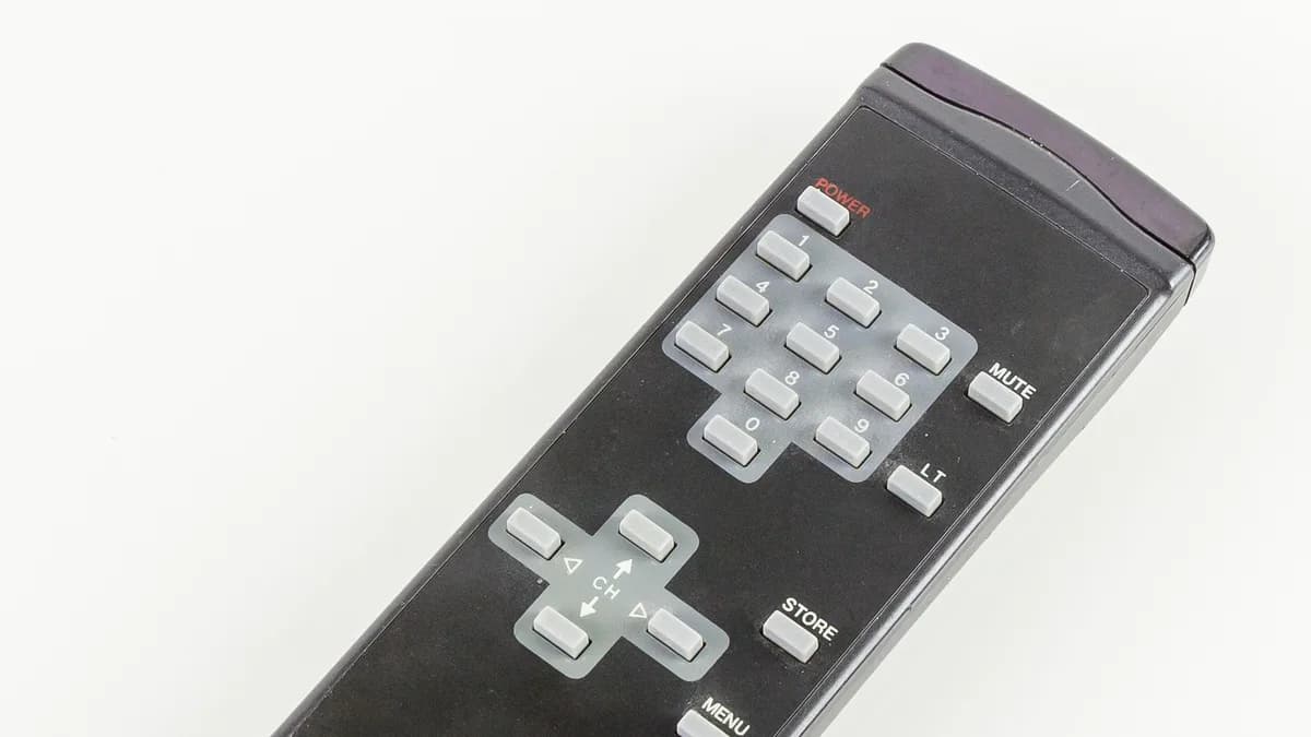 Television remote control used to navigate channels and guide